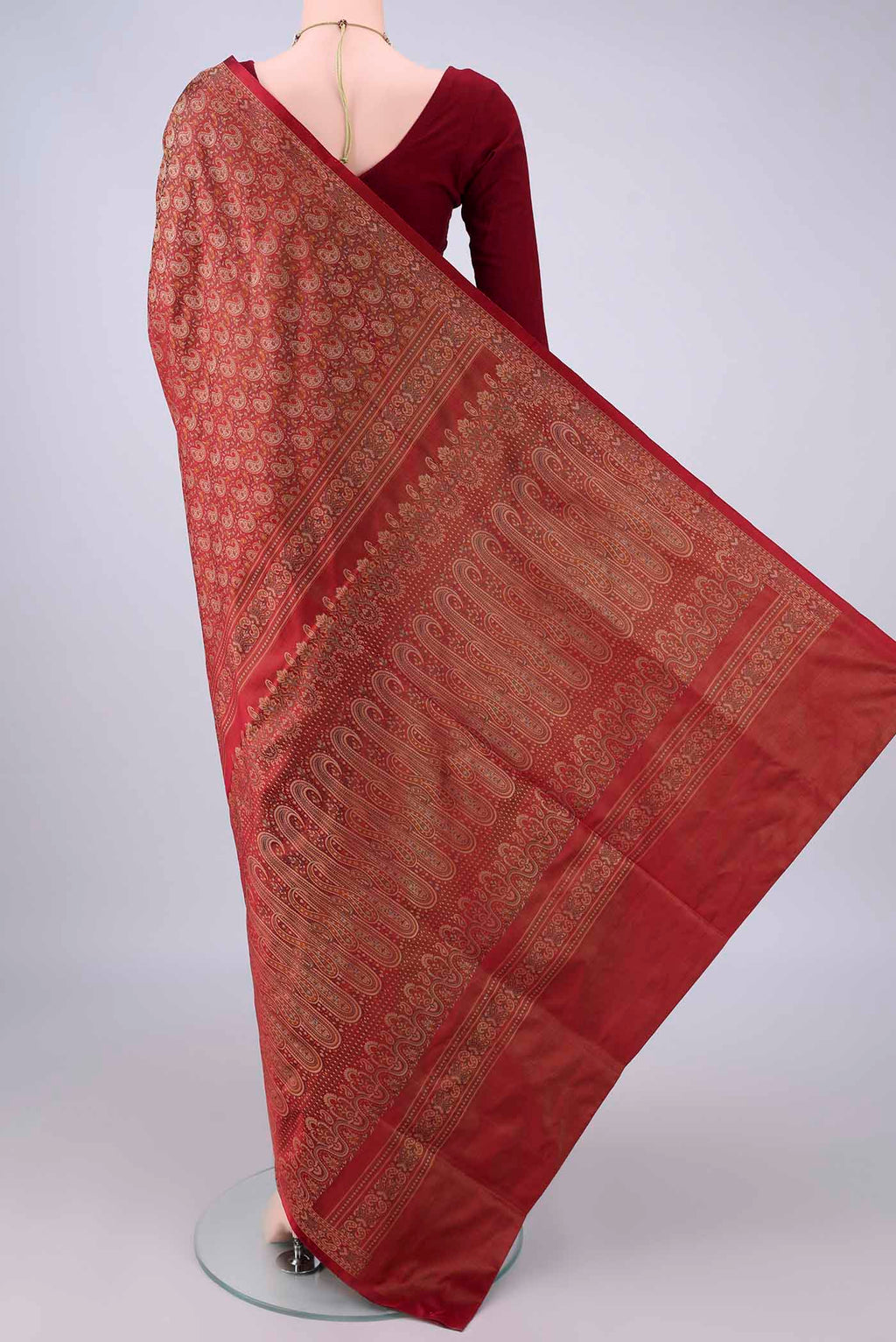 Flat view of Pure Silk Maroon Banarasi Tanchoi Saree with Thread Brocade on the body and Zari And Thread Border. 