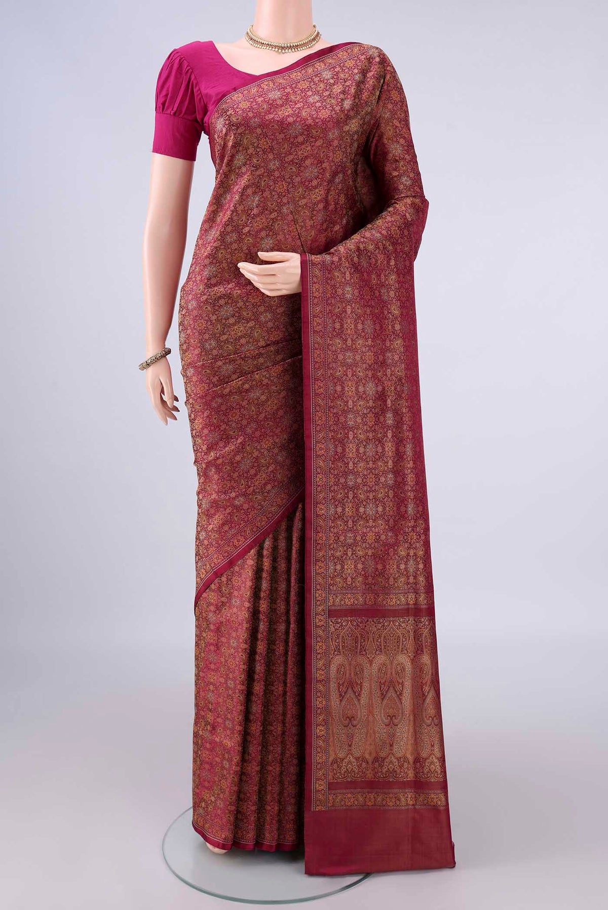 Pure Silk Magenta Banarasi Tanchoi Saree with Thread Brocade on the body and Zari And Thread Border.  displayed on a mannequin