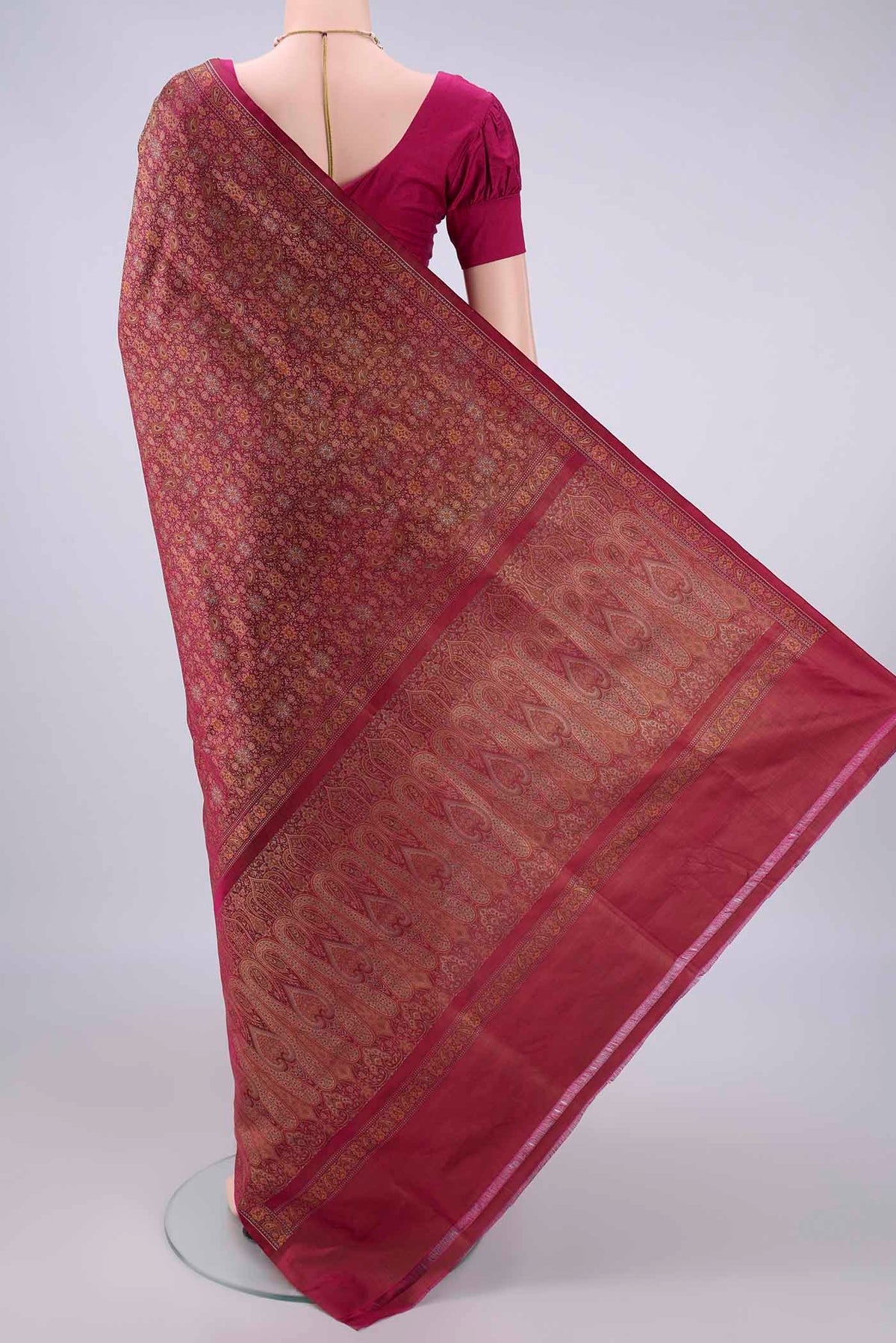 Flat view of Pure Silk Magenta Banarasi Tanchoi Saree with Thread Brocade on the body and Zari And Thread Border. 