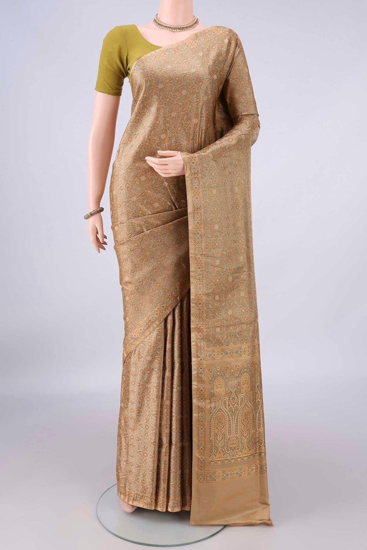 Pure Silk Beige Banarasi Tanchoi Saree with Thread Brocade on the body and Thread Border.  displayed on a mannequin