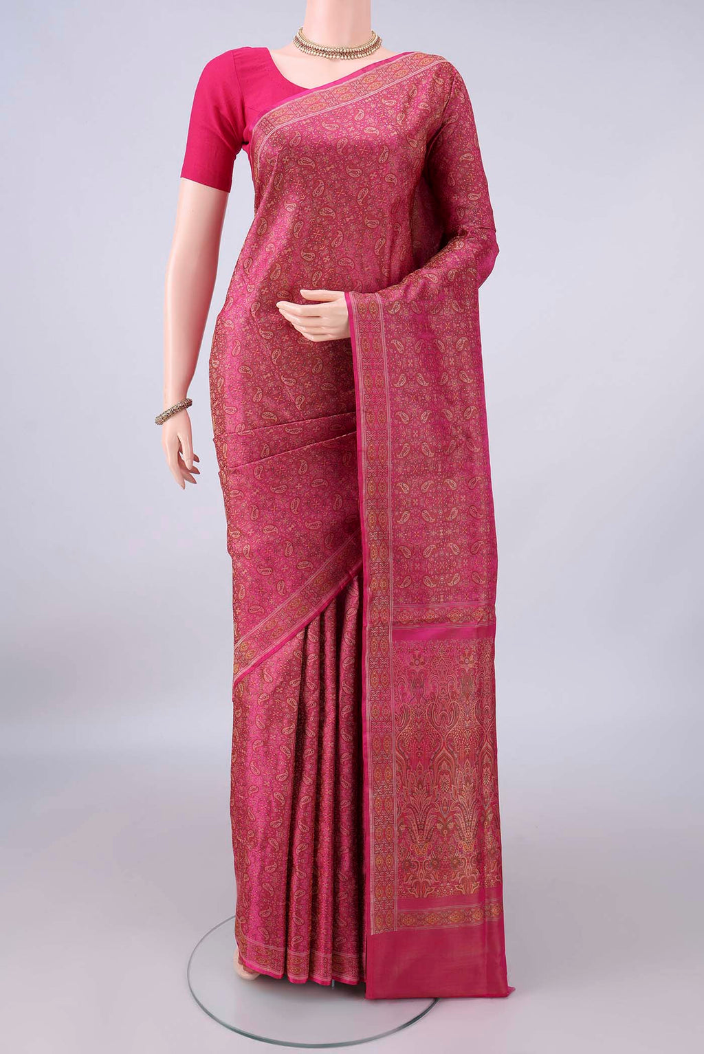Pure Silk Rani Pink Banarasi Tanchoi Saree with Thread Brocade on the body and Thread Border.  displayed on a mannequin