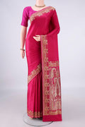 Rani Pink Banarasi Jamavar Saree with Plain Body and Thread Border.  displayed on a mannequin