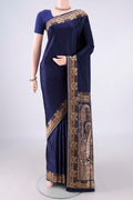Navy Blue Banarasi Saree with Plain Body and Thread Border.  displayed on a mannequin