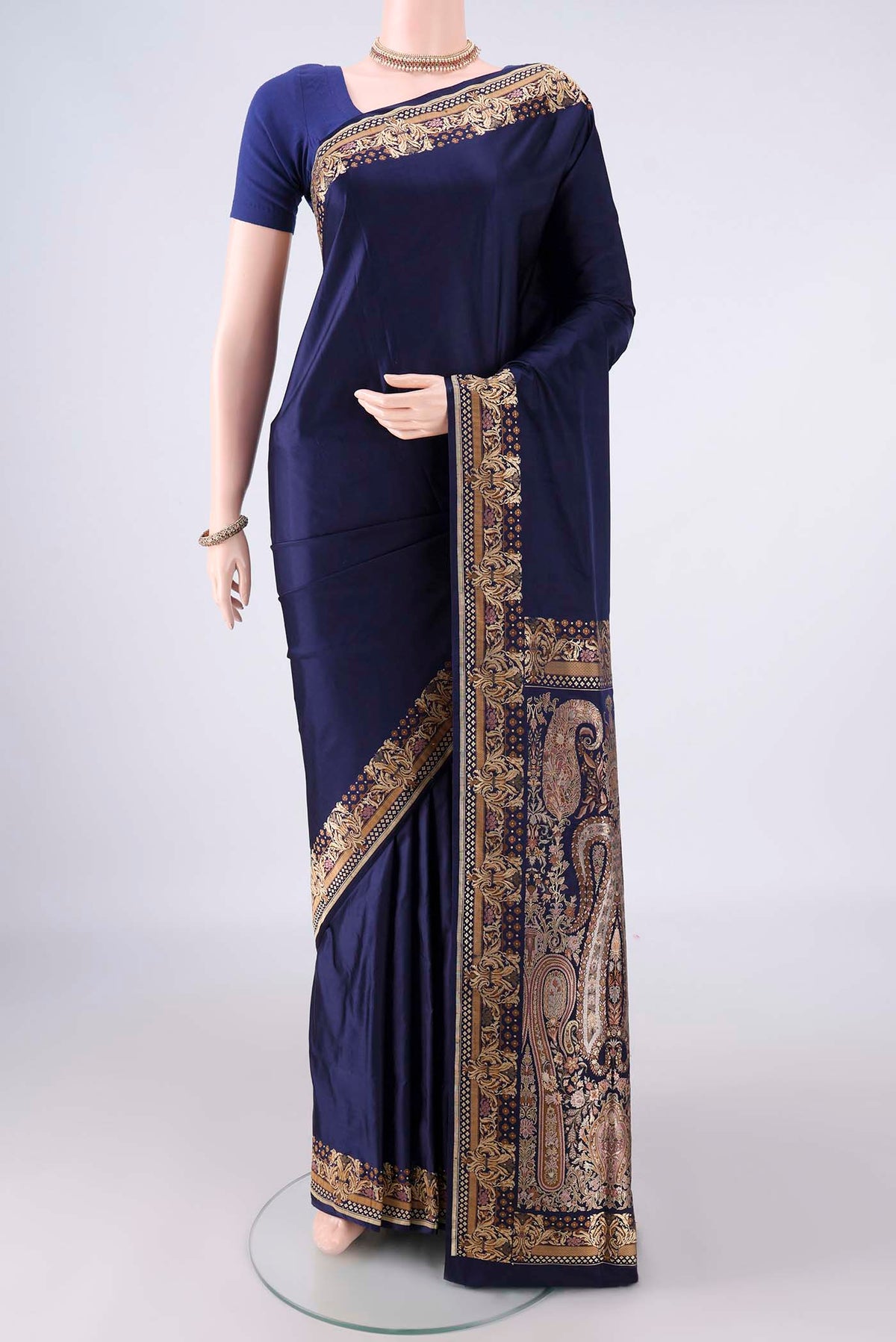Navy Blue Banarasi Saree with Plain Body and Thread Border.  displayed on a mannequin
