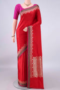 Red Banarasi Saree with Plain Body and Zari Border.  displayed on a mannequin