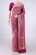 Pure Silk Magenta Banarasi Saree with Zari Brocade on the body and Zari Border.  displayed on a mannequin