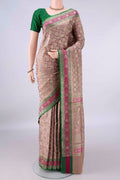 Pure Silk Beige Banarasi Saree with Zari Brocade on the body and Zari Border.  displayed on a mannequin