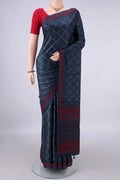 Blue Tussar Saree with Printed design on the body and Thread Border.  displayed on a mannequin