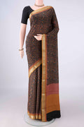 Black Mysore Crepe Saree with Printed design on the body and Zari Border.  displayed on a mannequin