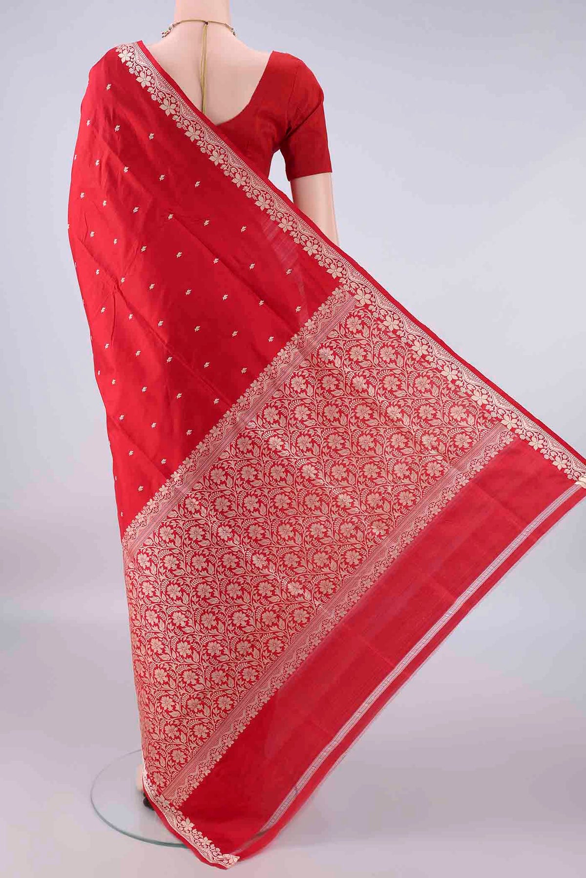 Flat view of Pure Silk Red Banarasi Katan Saree with Thread Butta on the body and Thread Border. 