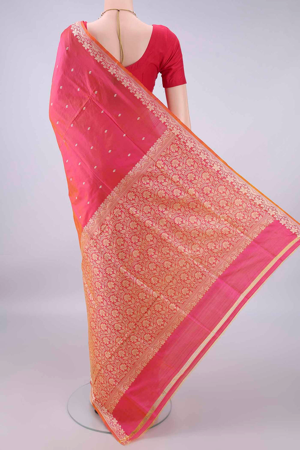 Flat view of Pure Silk Pinkish Yellow Dual Tone Banarasi Katan Saree with Thread Butta on the body and Thread Border. 