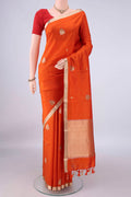 Pure Silk Orange Banarasi Katan Saree with Zari Butta on the body and Zari Border.  displayed on a mannequin