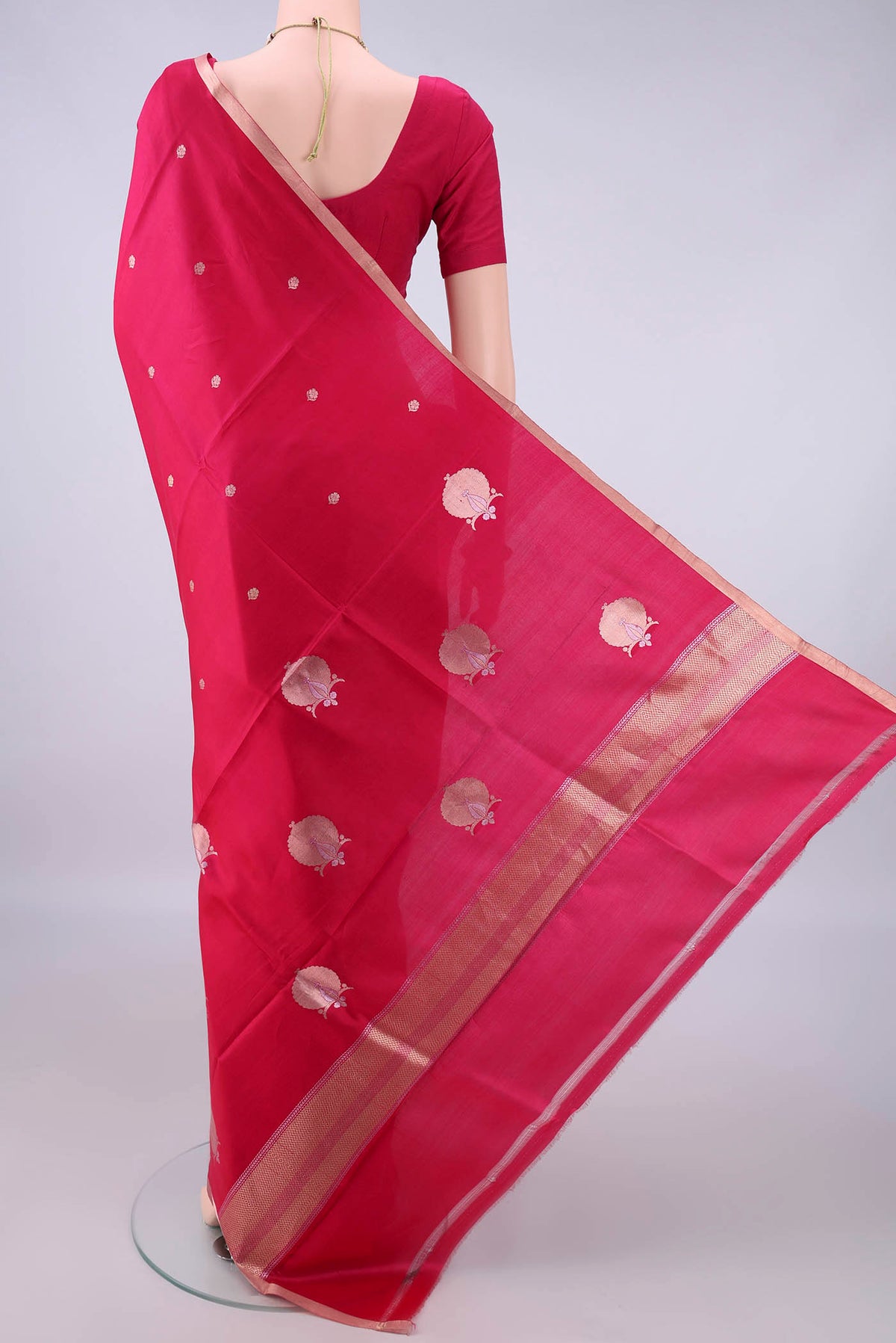 Flat view of Pure Silk Dark Pink Banarasi Katan Saree with Zari Butta on the body and Zari Border. 