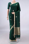 Pure Silk Bottle Green Banarasi Katan Saree with Zari Butta on the body and Zari Border.  displayed on a mannequin