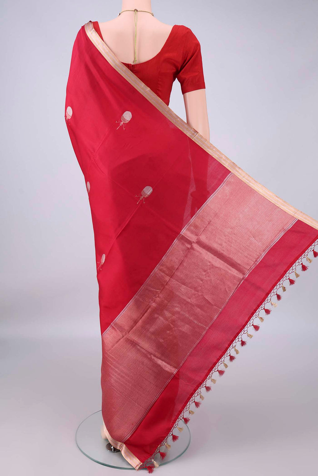Flat view of Pure Silk Red Banarasi Katan Saree with Zari Butta on the body and Zari Border. 