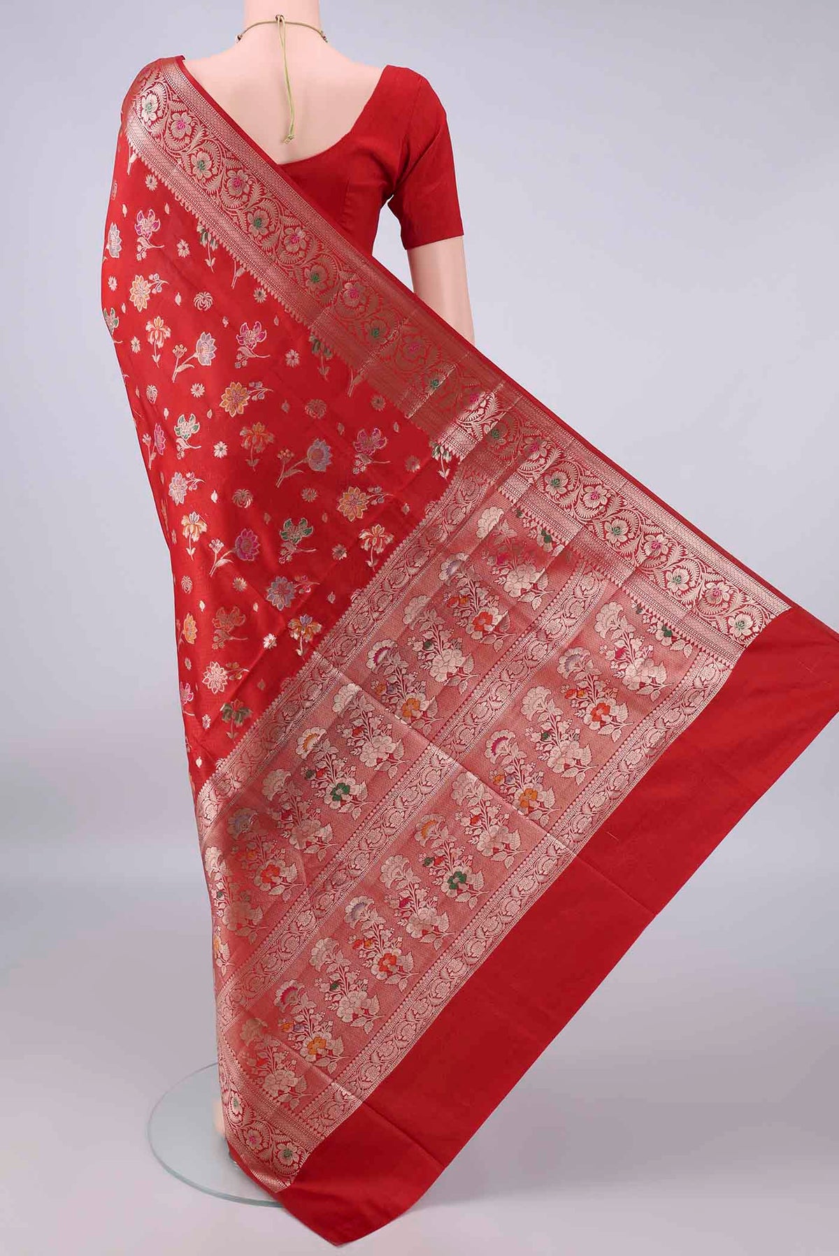 Flat view of Pure Silk Red Banarasi Raw Saree with Zari And Thread Butta on the body and Zari And Thread Border. 