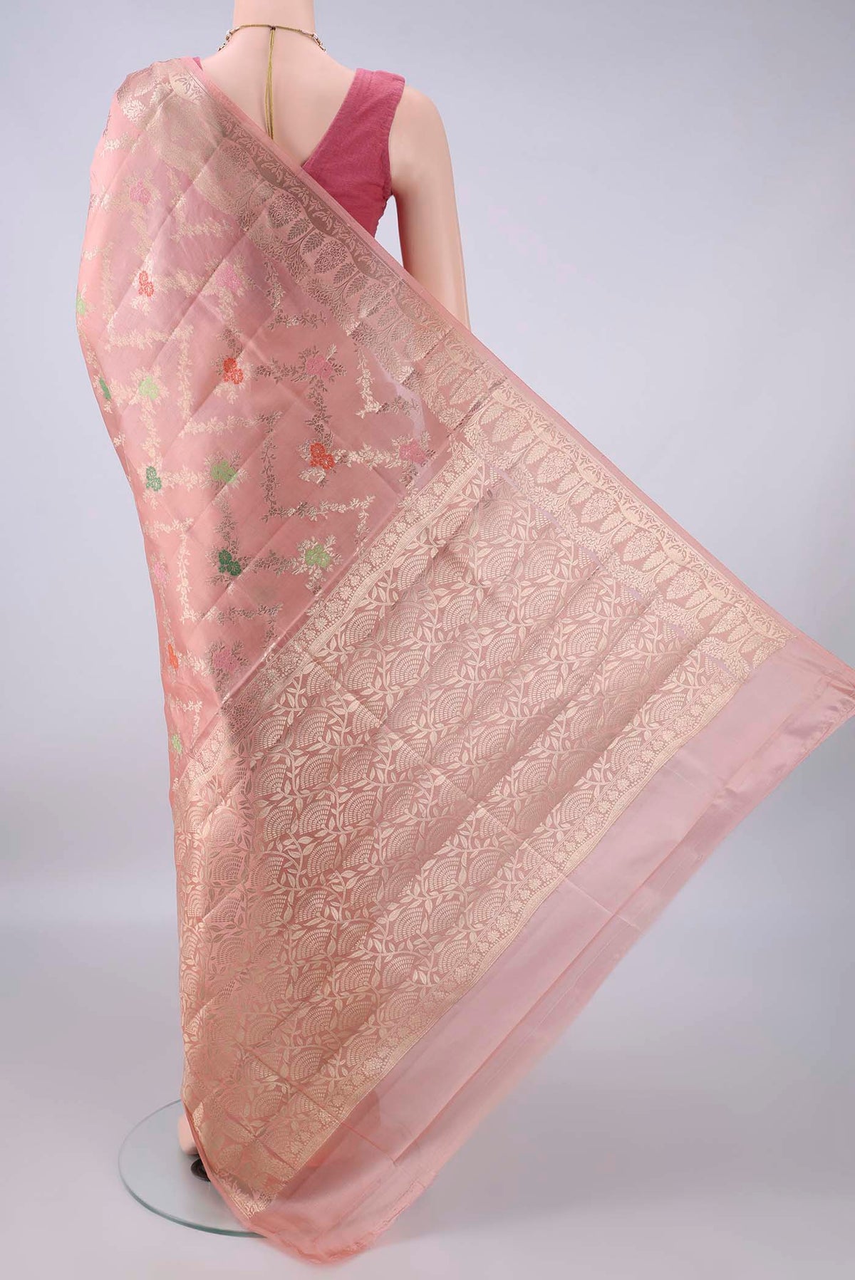 Flat view of Pure Silk Peach Banarasi Raw Saree with Zari Brocade on the body and Zari Border. 