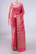 Pure Silk Pink Banarasi Raw Saree with Zari Brocade on the body and Zari Border.  displayed on a mannequin
