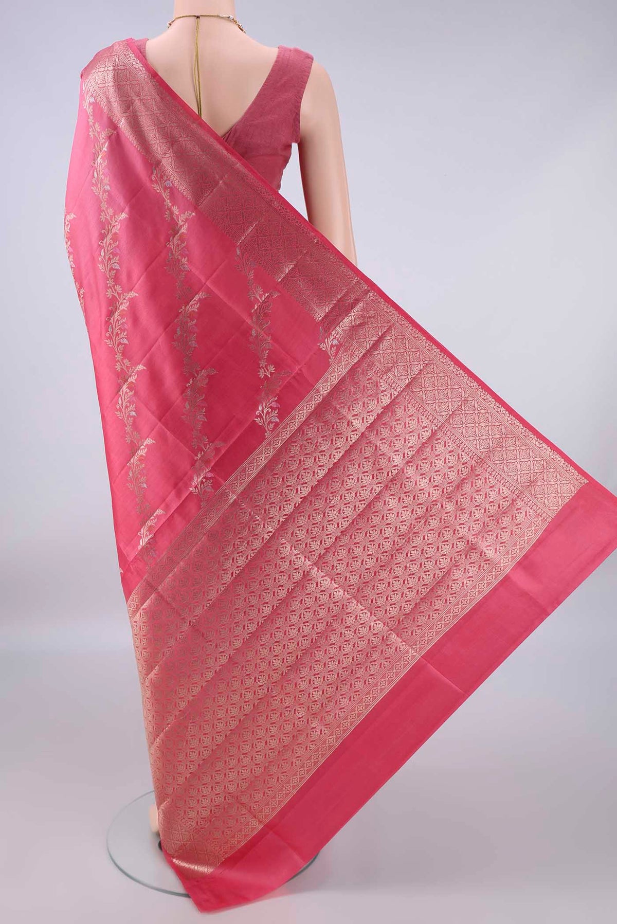 Flat view of Pure Silk Pink Banarasi Raw Saree with Zari Brocade on the body and Zari Border. 