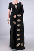 Pure Silk Black Banarasi Katan Saree with Plain Body and Zari Border.  displayed on a mannequin