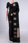 Pure Silk Black Banarasi Katan Saree with Zari Butta on the body and Zari Border.  displayed on a mannequin