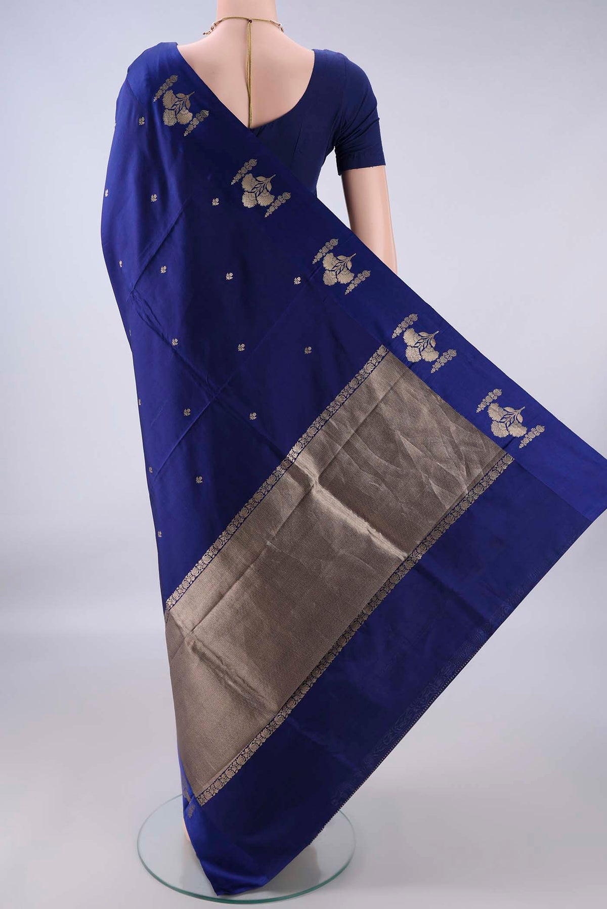 Flat view of Pure Silk Navy Blue Banarasi Katan Saree with Zari Butta on the body and Zari Border. 