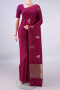 Pure Silk Magenta Banarasi Katan Saree with Zari Butta on the body and Zari Border.  displayed on a mannequin