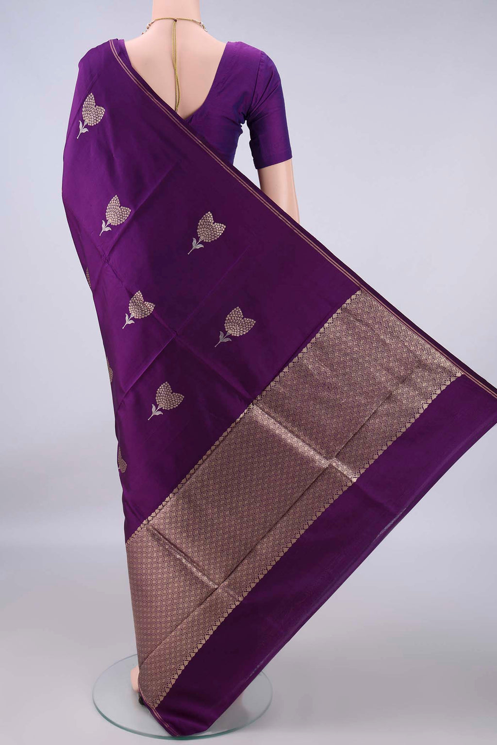 Flat view of Pure Silk Violet Banarasi Katan Saree with Zari Butta on the body and Zari Border. 