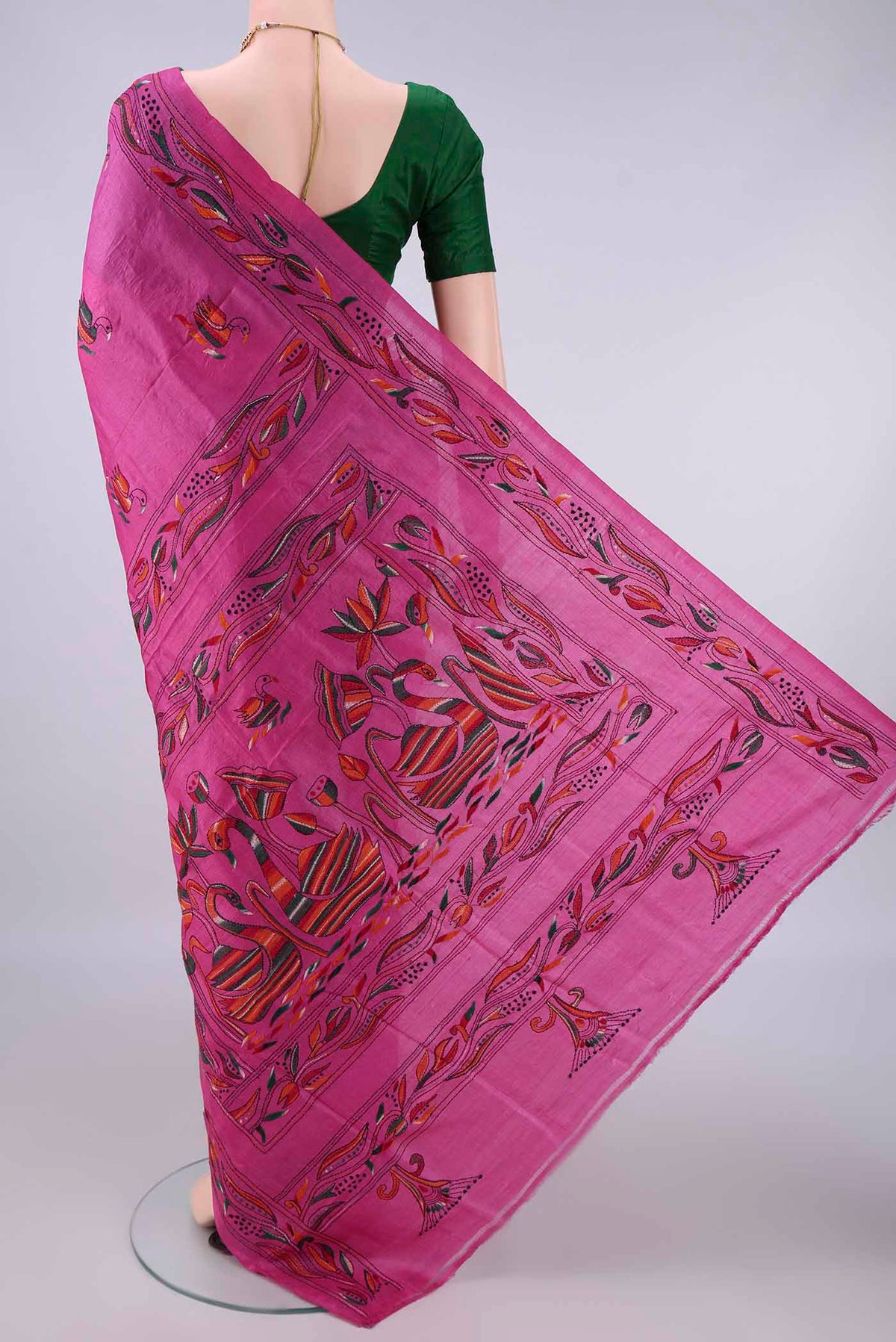 Flat view of Pure Silk Pink Kantha Saree with Kantha Work on the body and Thread Border. 