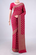Rani Pink Banarasi Georgette Saree with Zari Butta on the body and Zari Border.  displayed on a mannequin
