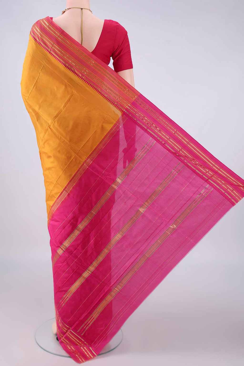 Flat view of Pure Silk Mustard Narayanpet Saree with Plain Body and Zari Border. 