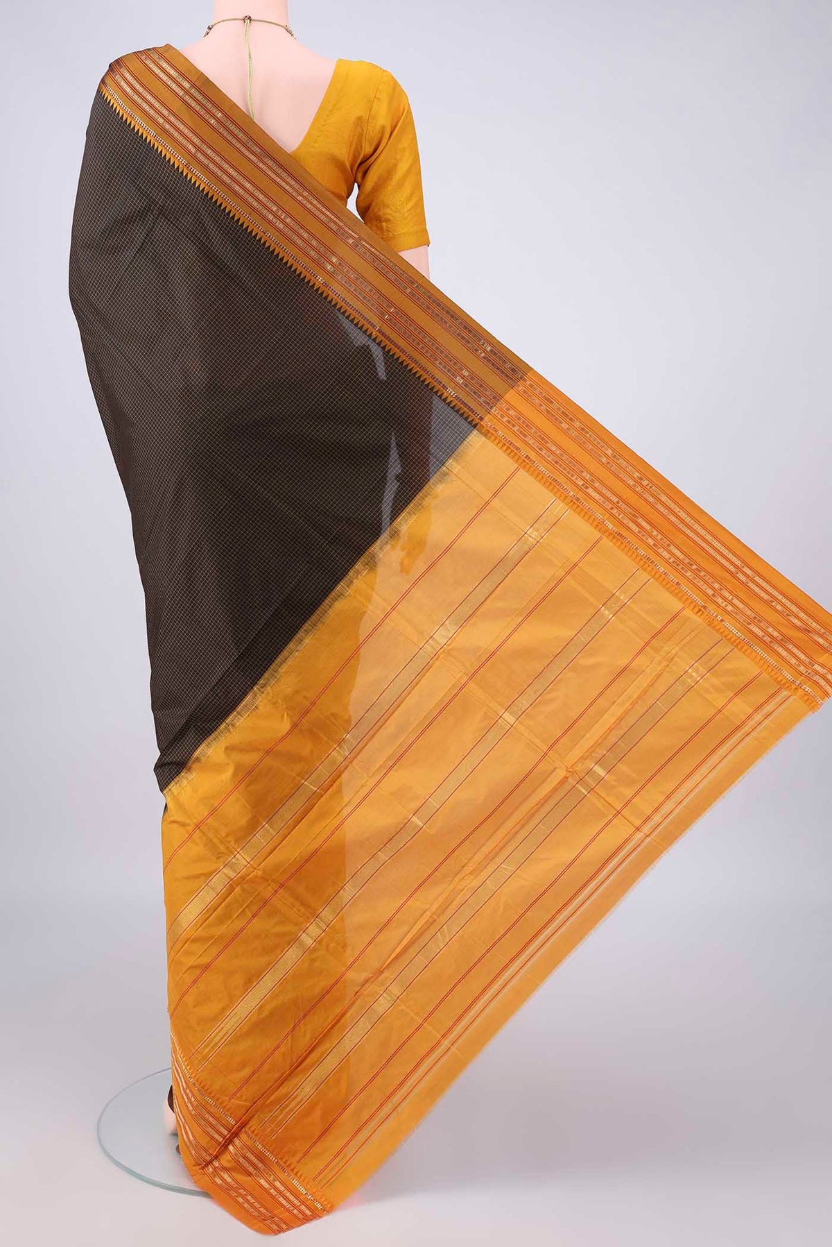 Flat view of Pure Silk Black Narayanpet Saree with Checked design on the body and Zari Border. 