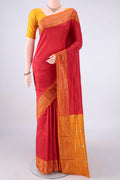 Pure Silk Red Narayanpet Saree with Checked design on the body and Zari Border.  displayed on a mannequin