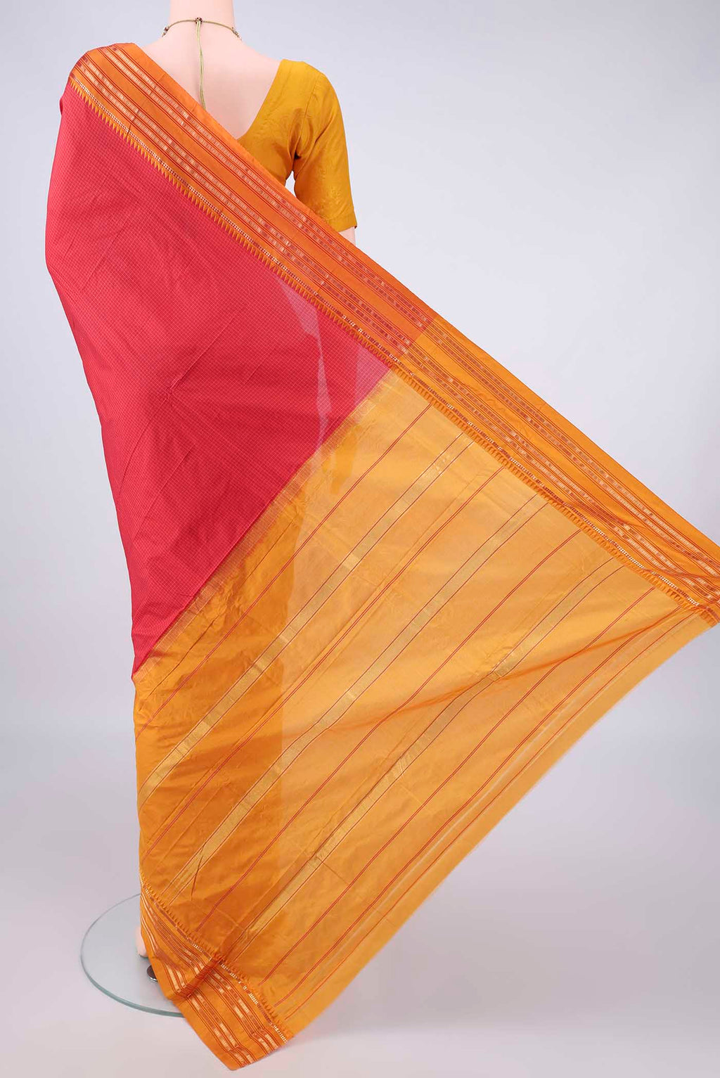 Flat view of Pure Silk Red Narayanpet Saree with Checked design on the body and Zari Border. 