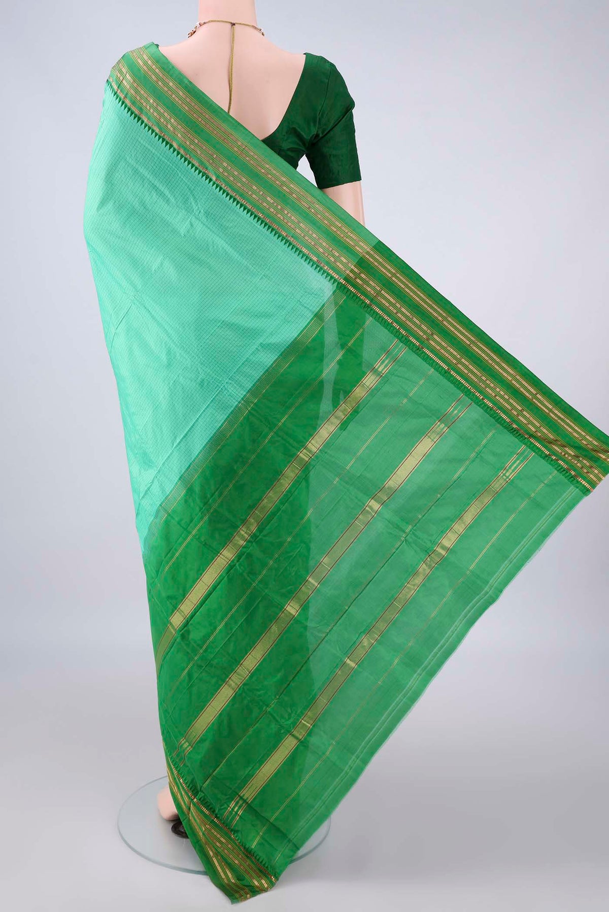 Flat view of Pure Silk Sea Green Narayanpet Saree with Checked design on the body and Zari Border. 