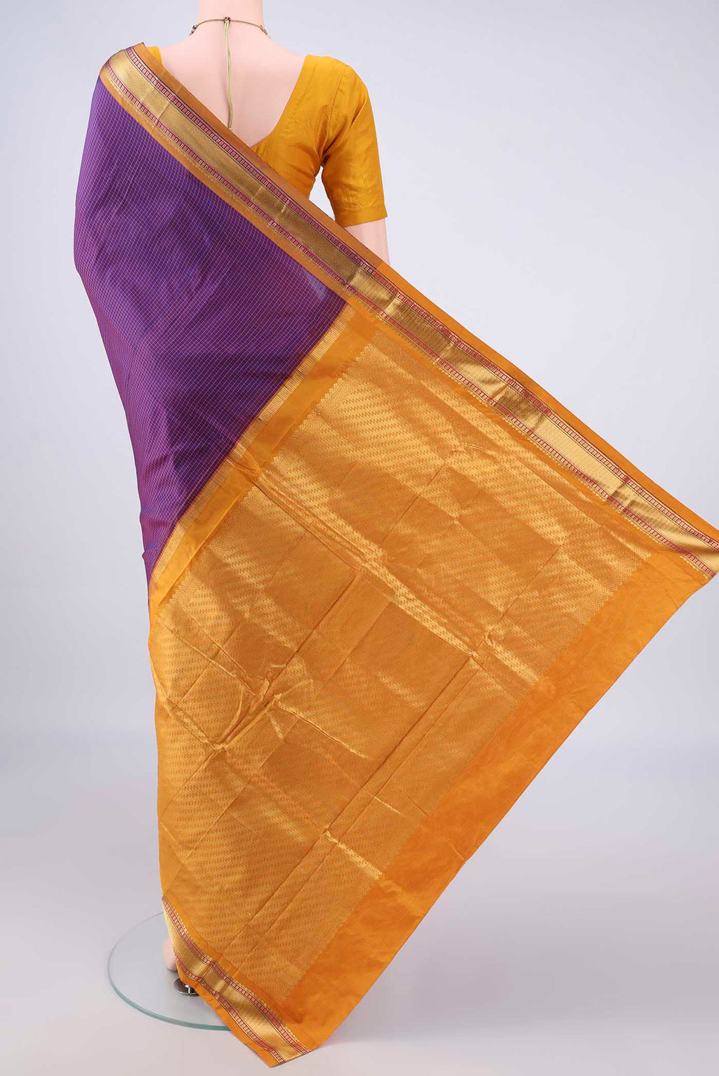 Flat view of Pure Silk Purple Narayanpet Saree with Checked design on the body and Zari Border. 