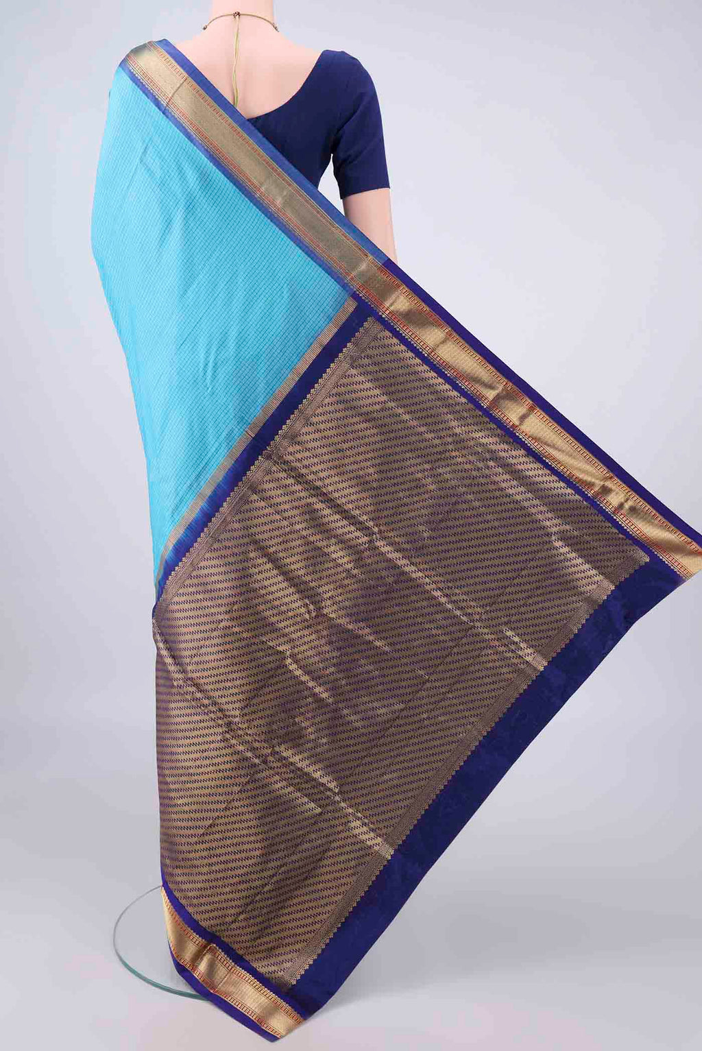 Flat view of Pure Silk Sky Blue Narayanpet Saree with Checked design on the body and Zari Border. 