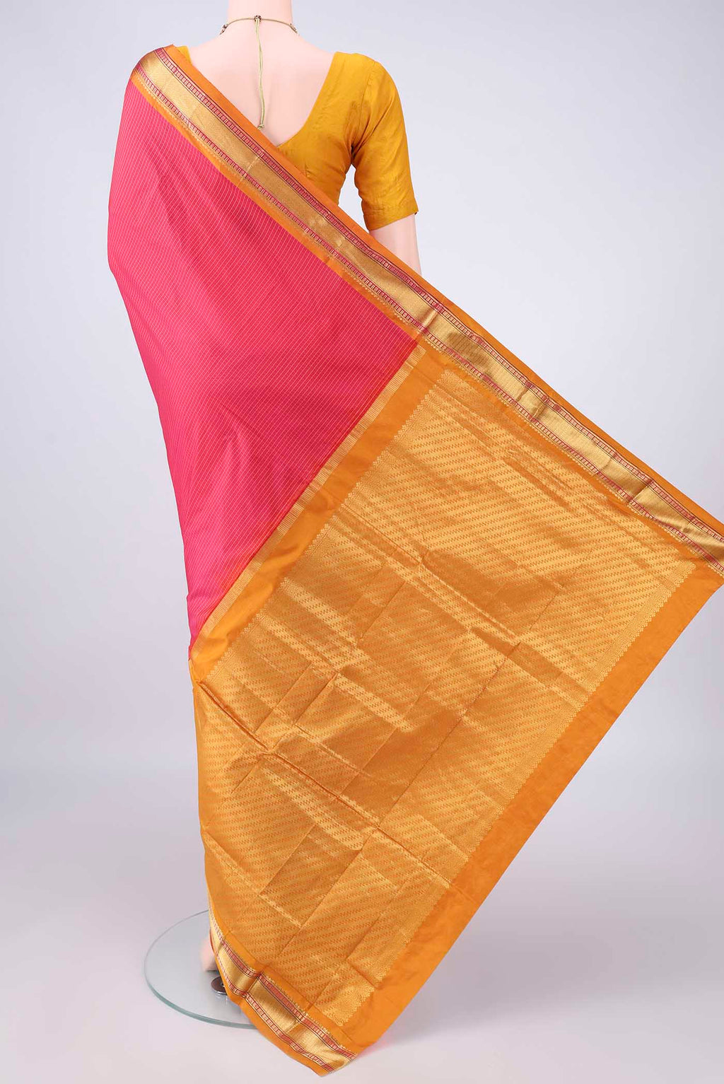 Flat view of Pure Silk Coral Narayanpet Saree with Checked design on the body and Zari Border. 