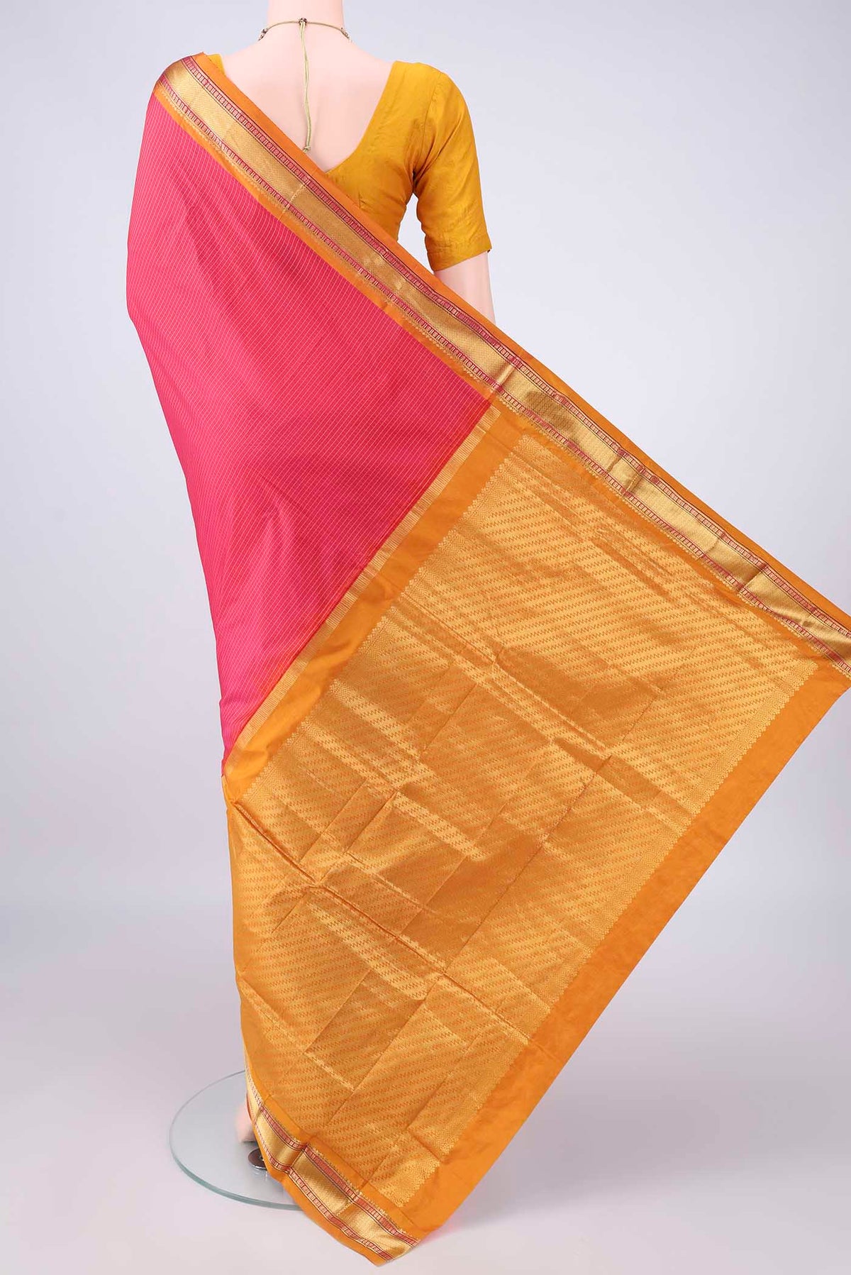 Flat view of Pure Silk Coral Narayanpet Saree with Checked design on the body and Zari Border. 
