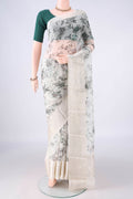 Pure Silk Off White Kota Saree with Floral Print on the body and Zari Border.  displayed on a mannequin