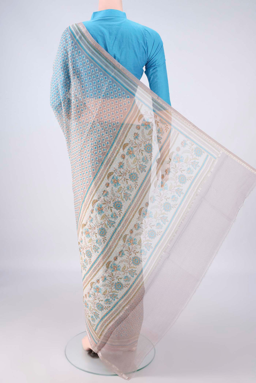 Flat view of Pure Silk Grey Kota Saree with Printed design on the body and Zari Border. 