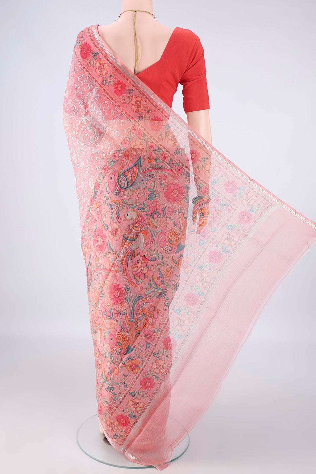 Flat view of Pure Silk Peach Kota Saree with Printed design on the body and Zari Border. 