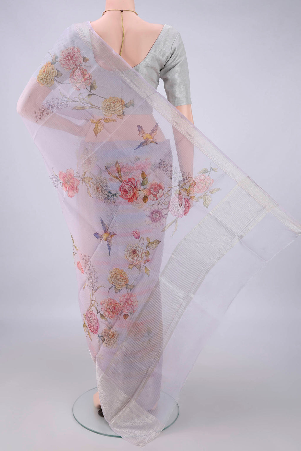 Flat view of Pure Silk Lilac Kota Saree with Floral Print on the body and Zari Border. 
