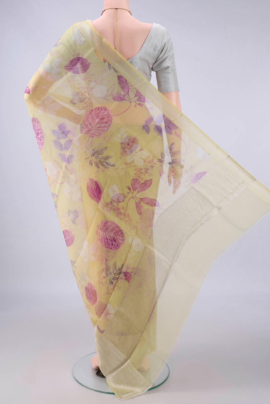 Flat view of Pure Silk Lemon Yellow Kota Saree with Floral Print on the body and Zari Border. 