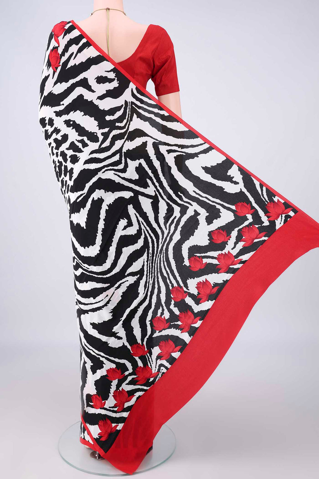Flat view of White Mysore Crepe Saree with Printed design on the body and Without Border. 