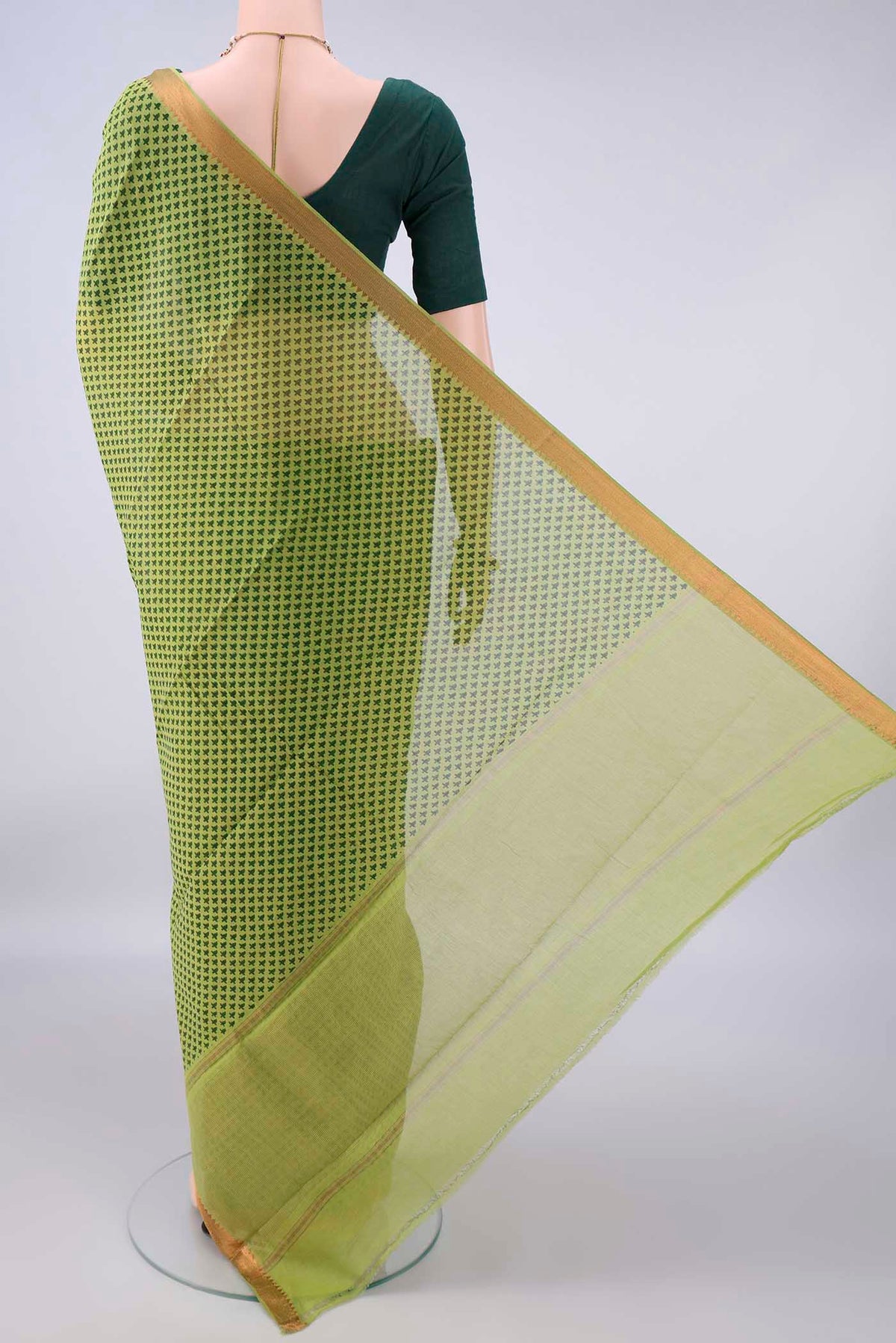 Flat view of Light Green Mangalagiri Cotton Saree with Printed design on the body and Zari Border. 
