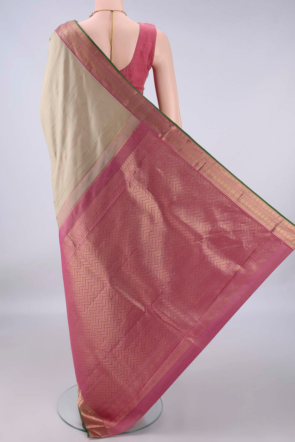 Flat view of Pure Silk Dark Beige Kanchipuram Saree with Zari Butta on the body and Zari Border. 