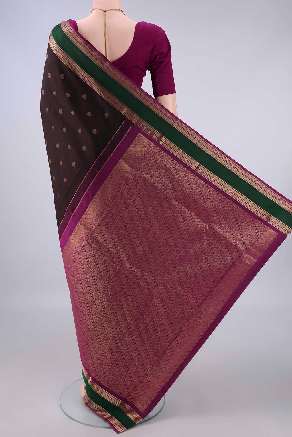Flat view of Pure Silk Coffee Brown Kanchipuram Saree with Zari Butta on the body and Zari Border. 