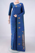 Pure Silk Peacock Blue Dual Tone Kanjivaram Saree with Plain Body and Without Border.  displayed on a mannequin