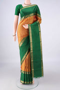 Pure Silk Pure Zari Mustard Kanjivaram Saree with Jacquard design on the body and Zari Border.  displayed on a mannequin